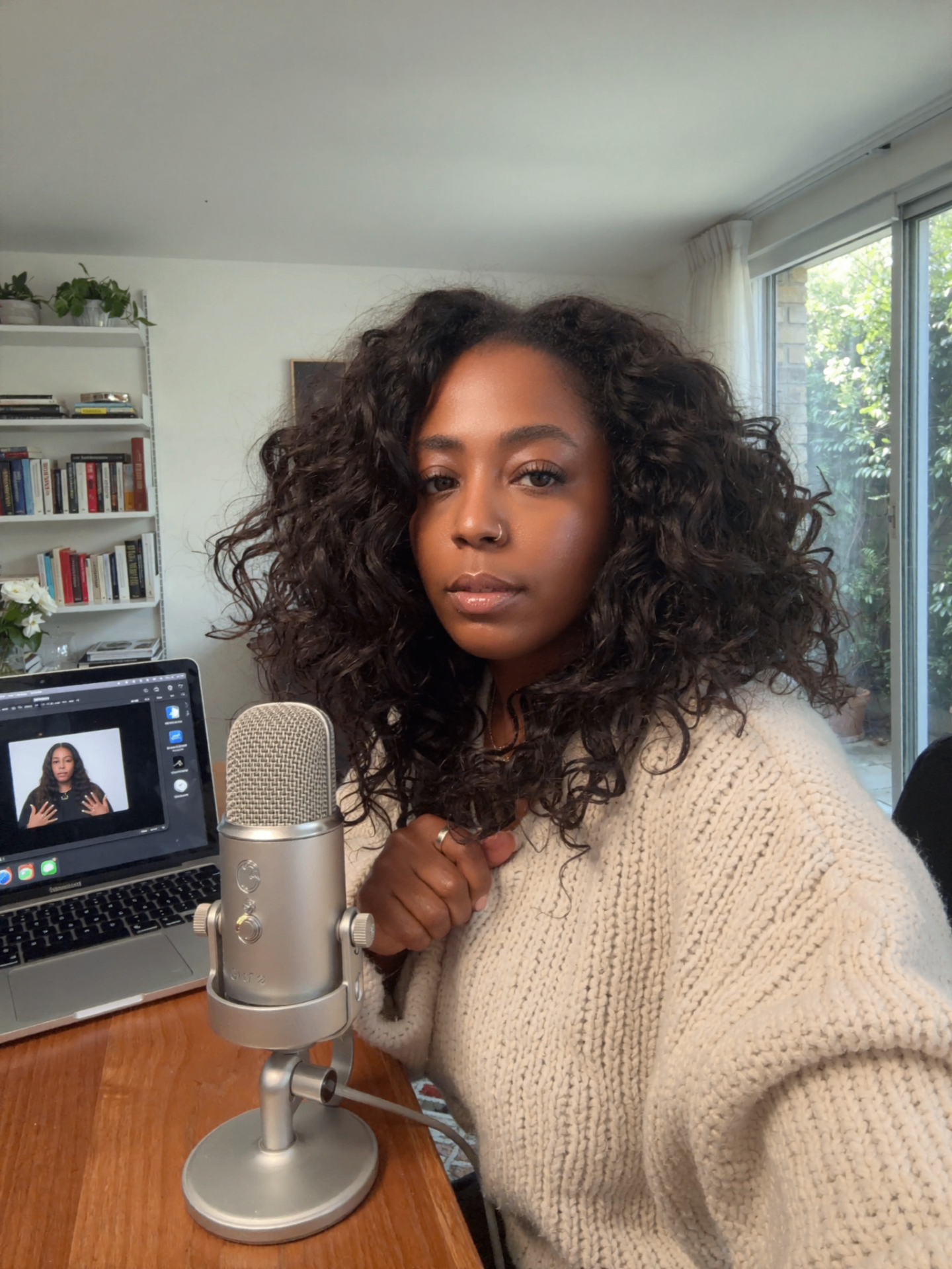 Tarean at her desk in Dallas — building the boat
